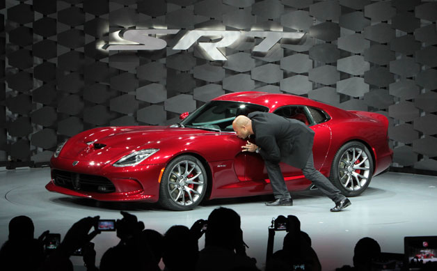 Ralph Gilles kisses the Viper at it's unveiling